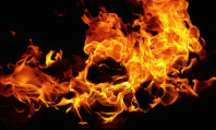 Imagem de fogo em fundo negro a ilustrar o "fire play fetiche"